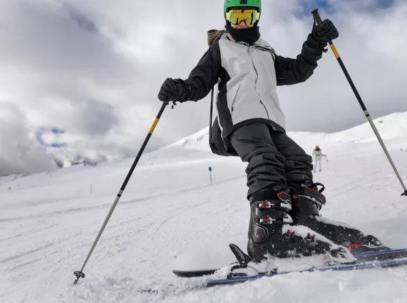 Teenage boy skiing at ski resort in the Alps